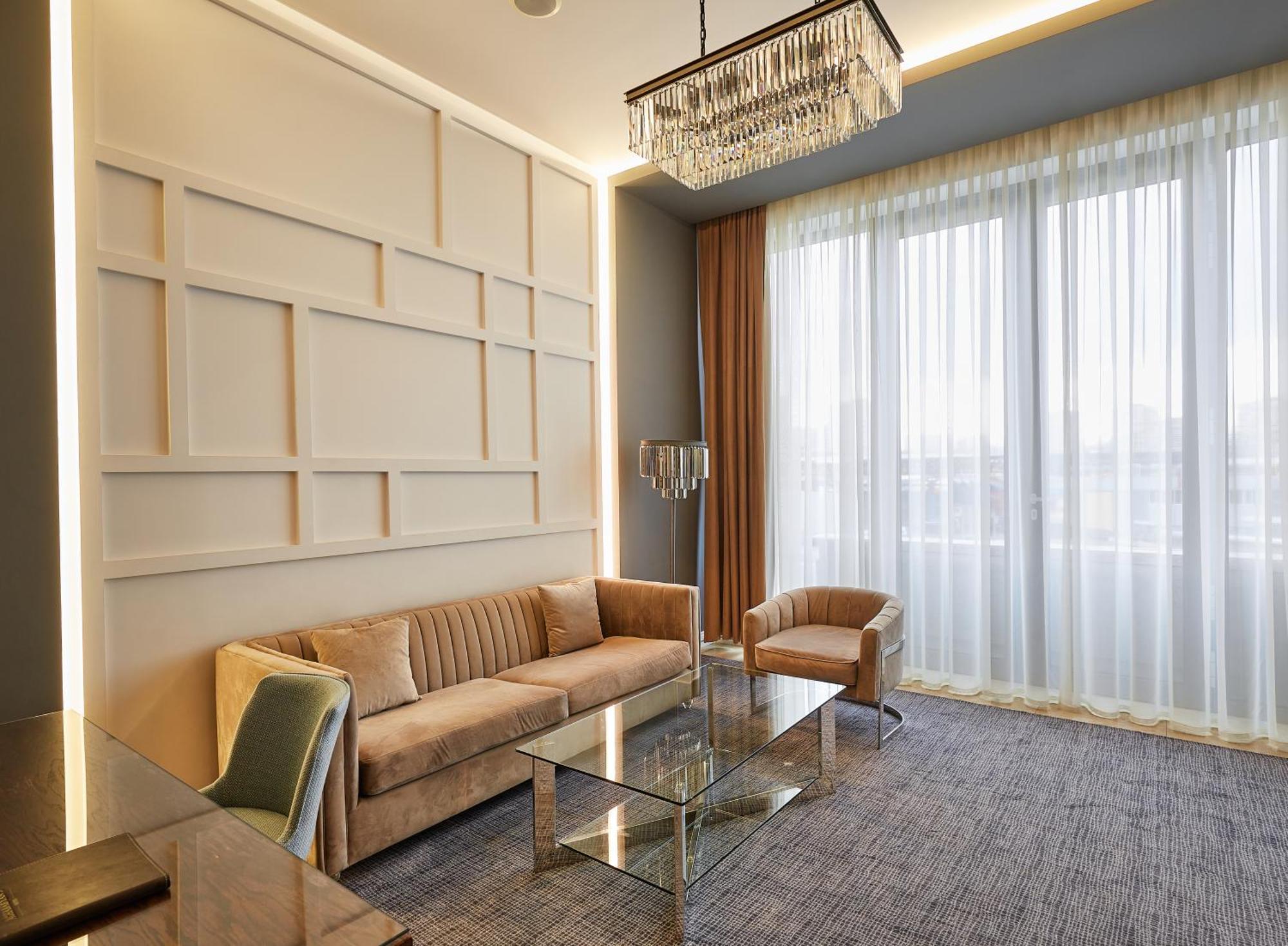 Aghababyan'S Hotel Yerevan Ngoại thất bức ảnh A living room in a suite at the hotel